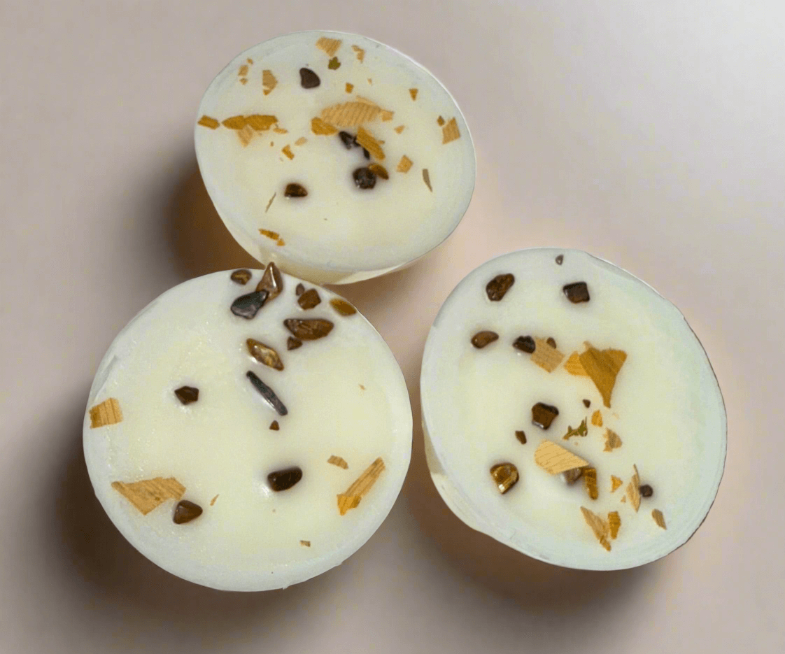 Sea Salt & Cocoa Bean infused wax melts with herbs and crystal chips for relaxing scents.